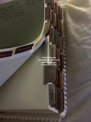 The cover image shows an open book with multiple tabs labeled with different names, slightly angled to the left. In the foreground, the pages are open, and at the right-side, are the labeled tabs. The text overlay is placed in the middle-right, showing some words.