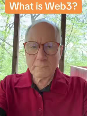 A man with glasses and a red shirt poses in front of a natural background with an orange bar at the top of the image displaying the text 'What is Web3?'.