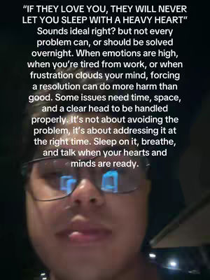 A selfie-style video thumbnail featuring a man with glasses looking at the camera with a neutral expression. Overlaid on the image is a block of text in a vertical orientation on the left side. The overall composition is simple, with the man's face taking up a significant portion of the frame.
