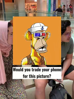 The cover image features an animated ape character from the Bored Ape Yacht Club NFT collection in the center, set against an orange background. The ape is wearing a sailor hat and 3D glasses. The image is framed by two people on the sides of the ape, and a question is overlaid at the bottom: "Would you trade your phone for this picture?"