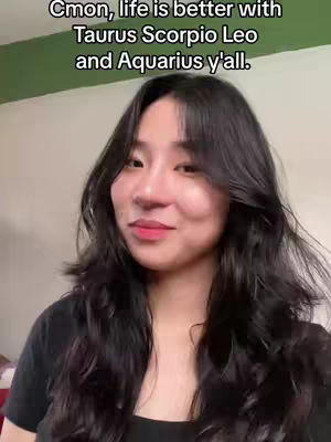 A young woman with long black hair is centered in the frame, looking slightly to the side with a soft smile. The image is from the chest up, with the background softly blurred, featuring a wall with a hint of green on top. Text overlay at the top indicates the video's theme, displayed in a clear, modern font.