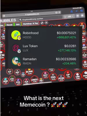 A person holding a tablet showing a cryptocurrency tracking app. The app displays a list of cryptocurrencies with their current prices and percentage changes. The background shows other app icons. The text overlay at the bottom suggests this is a video discussing the next potential meme coin.