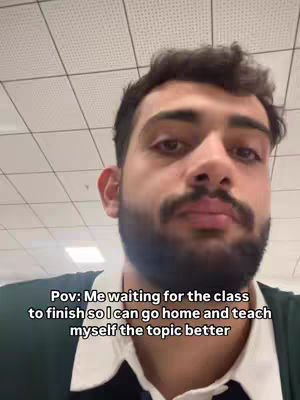 A selfie-style shot with the creator's face, with text overlayed at the bottom. The background shows a white tiled ceiling.