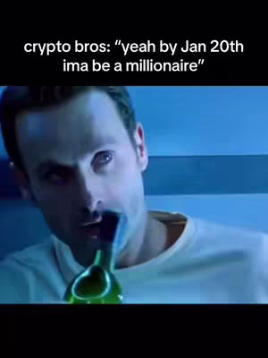 The image captures a man in a close-up shot, seemingly in a dim, cool-toned setting, possibly a room. He is holding a bottle, with its neck entering his mouth as if he's mid-drink. The lighting on him is soft which highlights his features, and the background appears to be blurred, focusing attention on the man.