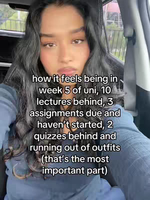 A young woman with long, dark hair sits in a car, looking at the camera. Text overlayed on the image details feelings about uni-related tasks.