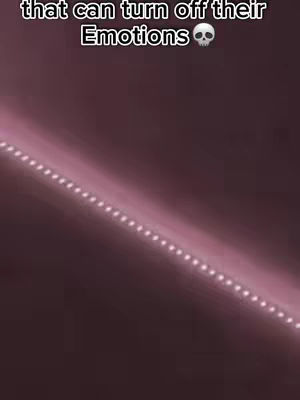 The cover image is a dark-themed, vertically-oriented shot. The background is mainly dark with a gradient of pinkish-purple hues. A string of small, evenly spaced white lights runs diagonally across the frame.