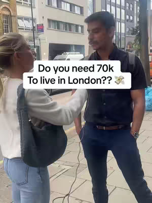 A woman in a white jacket is holding a microphone with a man in a blue shirt standing next to her. The background is a city street. The hook is a text overlay on a white background.