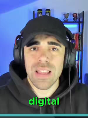 A man wearing a black hoodie and a black cap is the focus of the image. He has a headset on and is speaking. The text overlayed on the image says "digital". The background contains shelves with items on it.