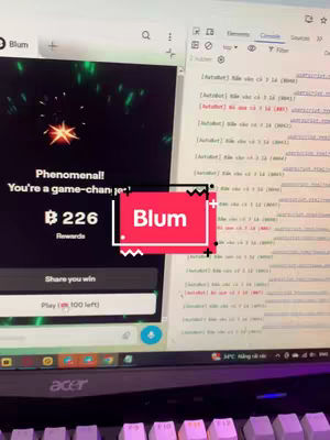 The cover image shows a computer screen displaying an app interface with the word 'Blum' highlighted by a red box. The screen also shows lines of code and other details about a game or app with reward information, surrounded by a keyboard. The overall composition is a mix of digital and tech elements.