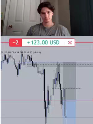 A man in a gray shirt is centered in the top half of the image, with door in the background. Below him is a display of a financial trading platform.