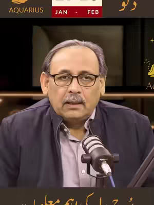 A man with a mustache, wearing glasses and a dark blazer, sits in front of a blurred background. A microphone is positioned in front of him. The video's title is displayed at the top, along with a calendar graphic.