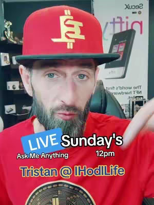 The image shows a man in a red hat and shirt, pointing downwards with his right hand. A superimposed text overlay announces 'LIVE Sunday's 12pm,' and the name Tristan @ IHodlLife is also present. The background suggests an office environment, with a blurred poster and shelves visible and has a warm lighting.