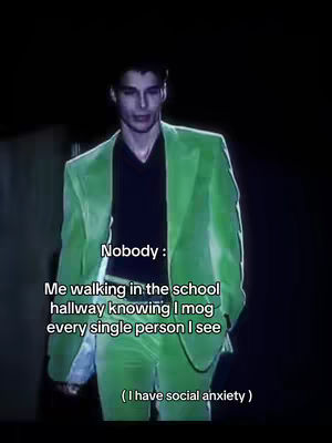 A man wearing a bright green suit is the main subject, set against a dark, slightly blurred background. Text overlays are added.