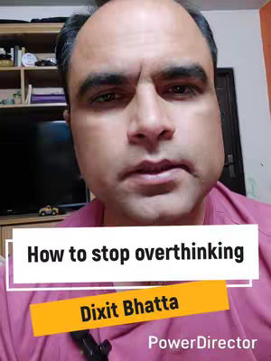 A selfie-style shot of a man against a slightly blurred background, wearing a pink shirt. Overlaid on the image are text elements related to the video's topic. The man has a serious facial expression.