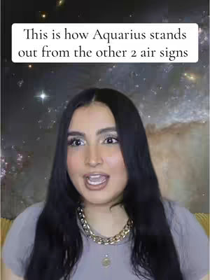 A woman with dark hair and makeup is positioned in front of a galaxy-themed backdrop. Text in a white box is displayed on top.
