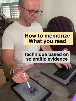 A man wearing glasses and a white t-shirt is seated at a desk with a laptop showing a keyboard and an open tablet with a scribbled design. Text overlays on the image read: “How to memorize What you read”, and “technique based on scientific evidence”.
