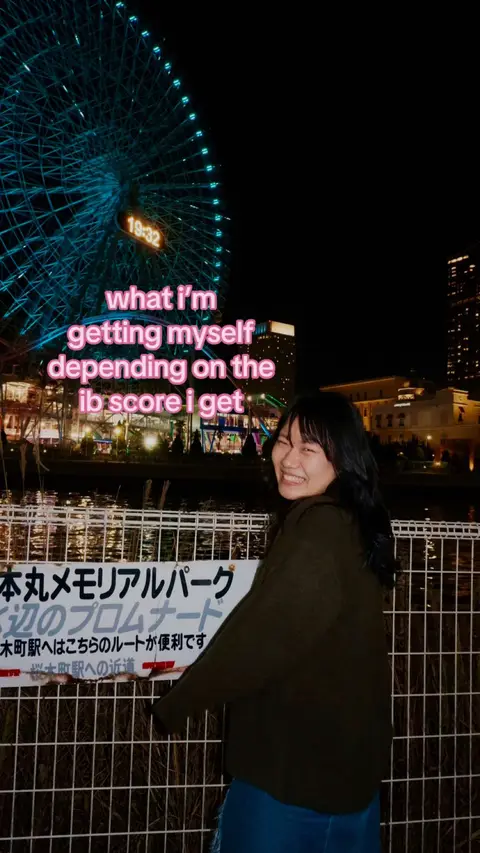 A woman smiles for the camera in front of a brightly lit Ferris wheel at night. The hook text is overlaid on the central part of the image, and a sign is partially visible towards the bottom. The background includes city lights and dark sky.