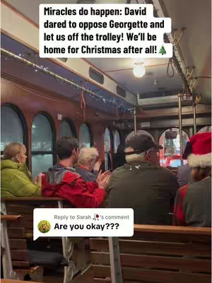 An interior shot of a trolley car filled with diverse passengers. The focus is on multiple individuals seated, and the lighting suggests an indoor setting. The overall tone indicates a casual, possibly comedic, scene within a public transportation environment.