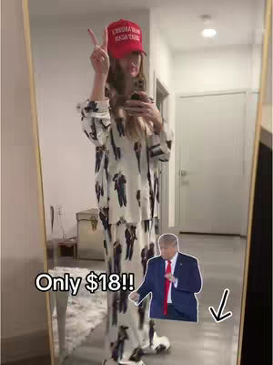 A woman wearing pajamas featuring silhouette figures of Donald Trump stands in front of a mirror, giving a peace sign with one hand and holding a phone with the other. A red baseball cap with white text is worn on her head. The image includes a cutout graphic of Donald Trump pointing downward, and the text overlay shows the price of the pajamas.