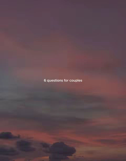 A vertical image featuring a sunset with a gradient of pink and purple hues across the sky. In the center, white text reads '6 questions for couples.' The overall composition evokes a sense of calm and reflection.