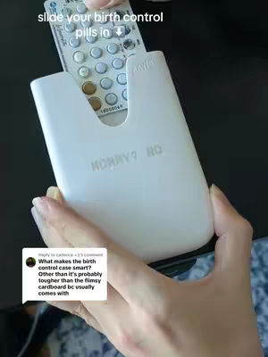A hand holds a white case, inserting a birth control pill blister pack. Text overlayed. At the bottom-left, a comment section discusses what makes it smart.