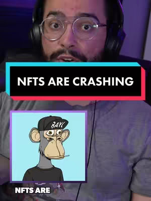 The cover image is a selfie-style shot featuring a man with glasses and a beard, wearing headphones. A text overlay states 'NFTs ARE CRASHING' in a black rectangle with white text. Below that, there's a smaller image of a cartoon ape wearing a hat and holding a cigarette. The background is a blurred domestic setting.
