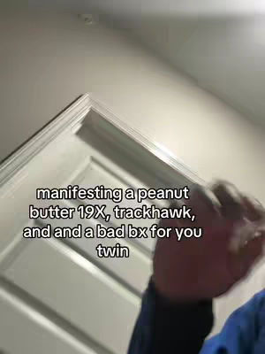 The cover image shows a person's arm and hand partially obscuring the view with text overlayed. The background seems to be the corner of a room with a door.