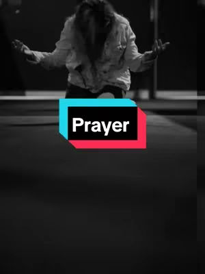 A grayscale image with a person kneeling in prayer with their hands raised. A text overlay reads "Prayer".