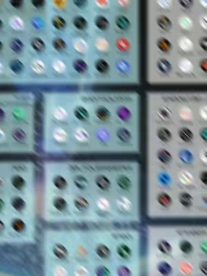The cover image shows a blurred background of what appears to be app icons on a digital screen. The icons are small circles with various colors and designs, arranged in a grid-like pattern. The overall image is heavily blurred, with the focus and clarity intentionally softened to imply motion or a technical digital topic as its background.
