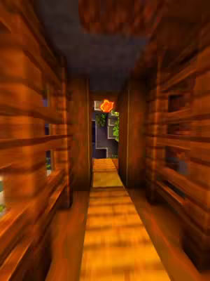An interior shot, presumably from a video game or virtual environment. The perspective is from the middle of a hallway, with wooden walls and floors. The walls are constructed of horizontally-aligned wooden planks separated by vertical supports, giving an impression of depth and texture. The floorboards are also made of wood, providing a seamless pathway through the space. There's a slightly blurred effect throughout, emphasizing the motion. At the end of the hallway, a glimpse of a garden and a bright flower is visible, adding a touch of color and contrast to the overall brown theme.