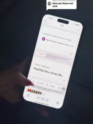 A vertical shot shows a smartphone held in hand, with a dating app open, displaying the text 'Find the love of my life'. The phone's screen is lit, showing a woman's hand with painted nails holding the phone. The background is dark