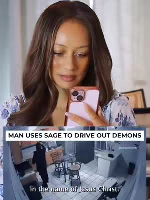 A woman with long, brown hair is holding a pink smartphone and looking down at the screen. Below, a split-screen shows a surveillance-style view of a kitchen with a shadowy figure, all within a white box.