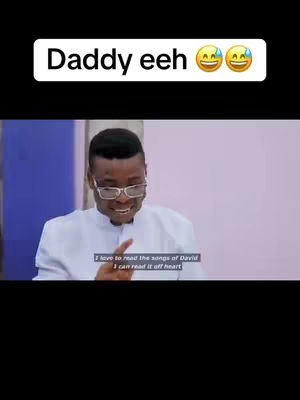 A man wearing glasses and a white shirt is smiling. Text overlay "Daddy eeh" in white, curved at the top. Below a text box says "I love to read the songs of David I can read it off heart".