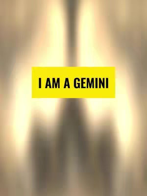 The cover image features a blurry, abstract background with light streaks, resembling a celestial or glowing effect. A bright yellow rectangle is placed centrally, containing the text 'I AM A GEMINI' in bold, black letters. The layout is simple and focuses on the text for immediate impact, using contrasting colors to make the message noticeable.