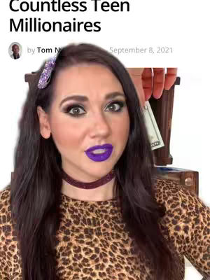 A woman with dark hair and eye makeup is the central focus. She wears a leopard-print top and a dark choker. The background features text at the top and a partial view of a wooden structure with a hand holding a bill.