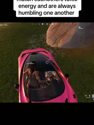 An overhead shot shows a pink car in a Fortnite game environment. Inside the car are two characters. In the top left corner, there's a text overlay in white.
