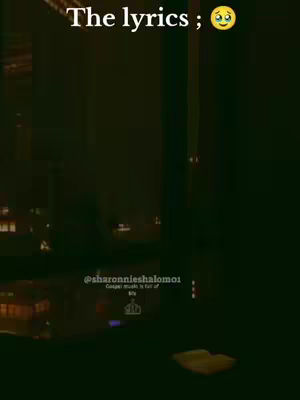 The image is of a dark, possibly nighttime scene. The primary colors are dark green and black, suggesting a low-light environment. In the upper portion of the image, the text overlay "The lyrics ; 😉" is visible. In the lower part of the image the username "@sharonnieshalom01" appears, along with text that reads "Gospel music is full of..." followed by the end of the sentence, which is cut off. Also visible in the bottom is a crown icon.
