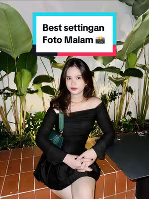 A woman poses in front of lush green foliage, wearing a black off-the-shoulder dress. A text overlay in a rectangular box at the top highlights the topic. The setting looks like a nicely lit outdoor area.