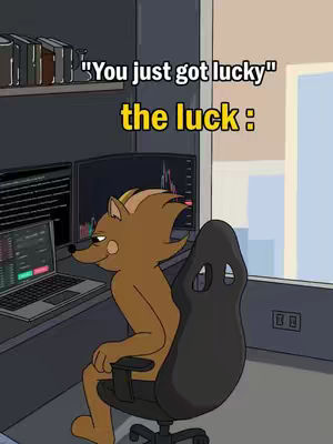 An animated image of a fox-like character sitting in a computer chair in a room. The character sits in front of two computer screens displaying financial charts. There is text overlayed on the image that reads 'You just got lucky' and 'the luck'. The overall composition includes a window.