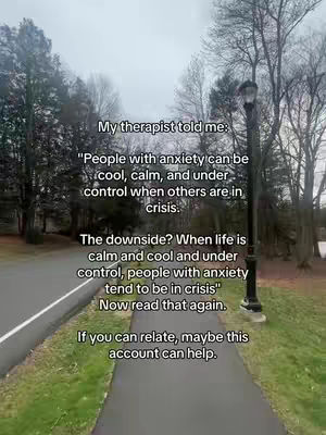 The image shows a path leading into the distance with trees on either side and text overlayed on the image. The text includes a block quote from a therapist about anxiety.