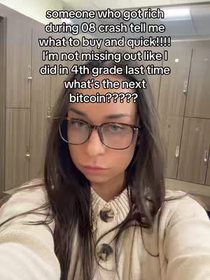 A selfie-style shot featuring a woman with dark hair and glasses. The upper portion of the image contains overlaid text. The woman is positioned closely to the camera, and the neutral background shows storage cabinets.