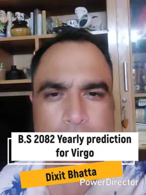 The cover image features a man in a close-up shot, set against a backdrop of a bookshelf on a wooden cabinet, that includes books, decorative items, and shelves. Text overlays indicate the subject matter is about predicting astrological predictions for Virgo. The composition suggests a personal, informative video content.