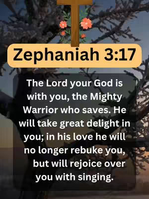 An image with a background of branches and a blurred sky. Overlaid is text about of Zephaniah 3:17, within a yellow rectangle. A wooden cross with two flowers sits above the text box. The color palette is muted, with earth tones and some light blue.