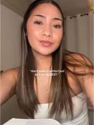A young woman is the primary subject, framed from the chest up. She has long, light brown hair and is wearing a white top. The background is a neutral-toned interior with curtains. Overlayed text offers a quote.