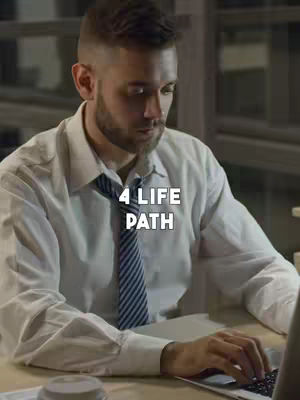 A man in a white dress shirt and striped tie is shown working on a laptop. The overlay text reads "4 LIFE PATH". The background is a dimly lit room. The man is looking down at his laptop, and the lighting is soft and professional.