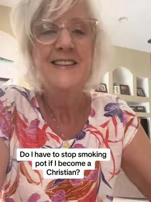 The cover image features a woman with short, wavy gray hair and glasses, smiling directly at the camera. She's wearing a colorful floral top. Below her, a white text box displays a question in black text. The background shows a living space with hints of decor.