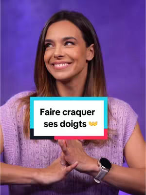 The cover image features a woman smiling at the camera. The foreground includes her hands joined together in front of her, with one finger overlaying the other. She is wearing a light purple top and a wristwatch with a silver strap. A text box in the middle, has a colored background with, "Faire craquer ses doigts" written in white. The background is a gradient of purple.