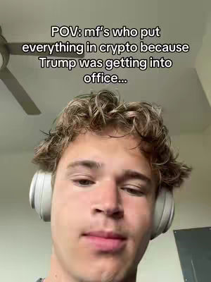 A young man with curly brown hair wearing headphones is centered in a selfie-style shot against an indoor background. Text overlays are placed near the top of the image.