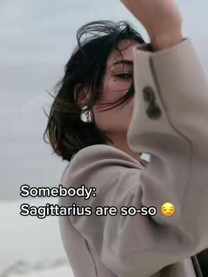 A woman with dark hair and neutral clothing raises her arm in front of a cloudy background. Text is overlaid at the bottom.