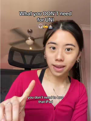 A young woman with dark hair and fair skin is seated, wearing a red shirt and pointed a finger at the viewer. Above her, the text overlay informs the viewer what they do and don't need for university.